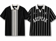 Load image into Gallery viewer, Two black short-sleeve polo shirts with white vertical stripes and white collars, displayed side by side on a white background. The shirt on the left has a front zipper and white vertical stripes down the center, while the shirt on the right features 'AXEPEAK' in white arched lettering on the chest, a circular 'Z' logo, and script branding.
